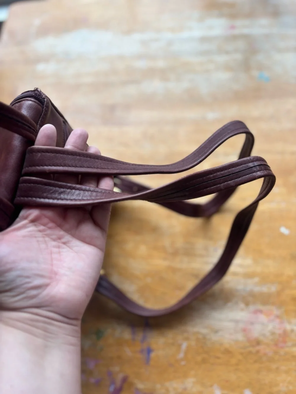 Tiganello Smooth Leather Backpack in Dark Brown with Gold Accent